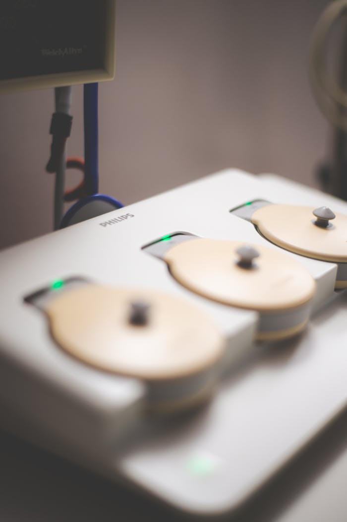 Blurred focus on a medical control panel, showcasing modern healthcare technology.